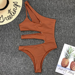 Sexy irregular stitching cutout one-piece bikini